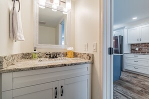 Combined shower/bathtub, hair dryer, towels, soap