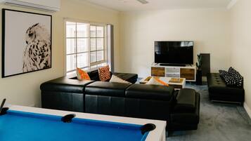 Smart TV, fireplace, DVD player, ping pong