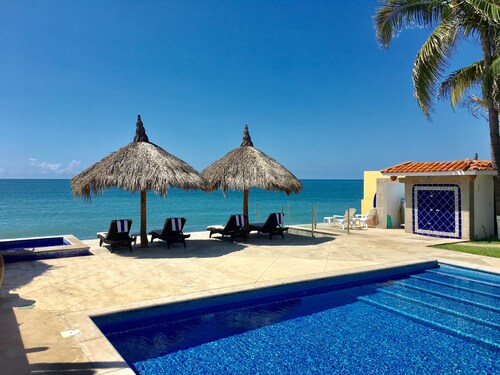 Beachfront villa,  heated pool, jacuzzi. Sleeps 16 perfect sunsets every night