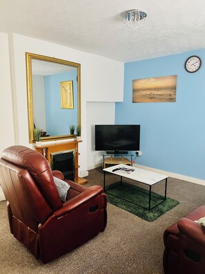 Télévision, cheminée