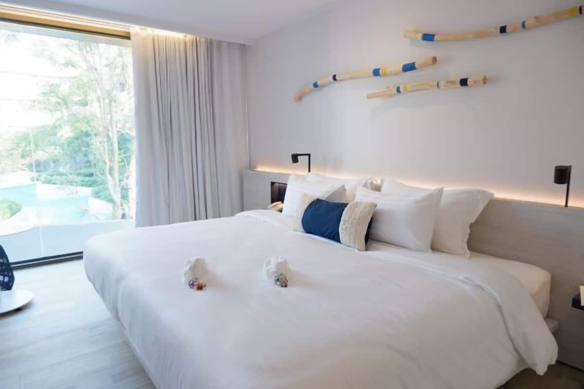 3 dormitorios, minibar, caja fuerte y cortinas opacas
