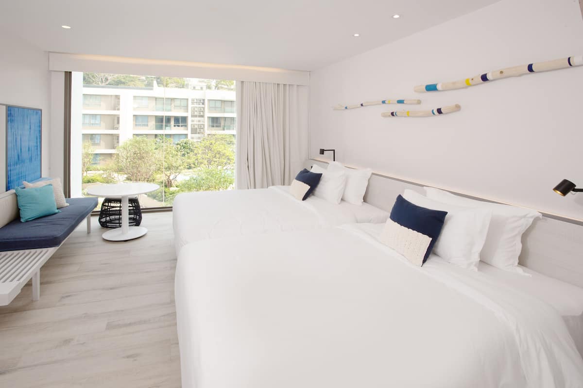 Premium Deluxe Twin | 3 dormitorios, minibar, caja fuerte y cortinas opacas