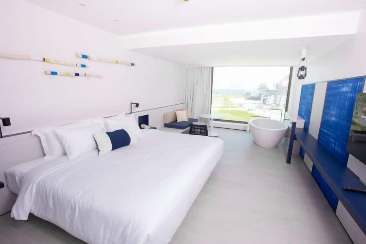 3 dormitorios, minibar, caja fuerte y cortinas opacas
