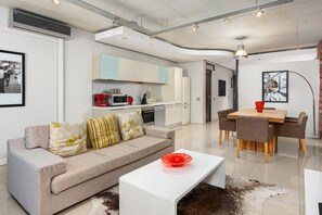 Grand Apartment | Living room | 50-inch flat-screen TV with cable channels, TV - Metropolis 806 (Cape Town)