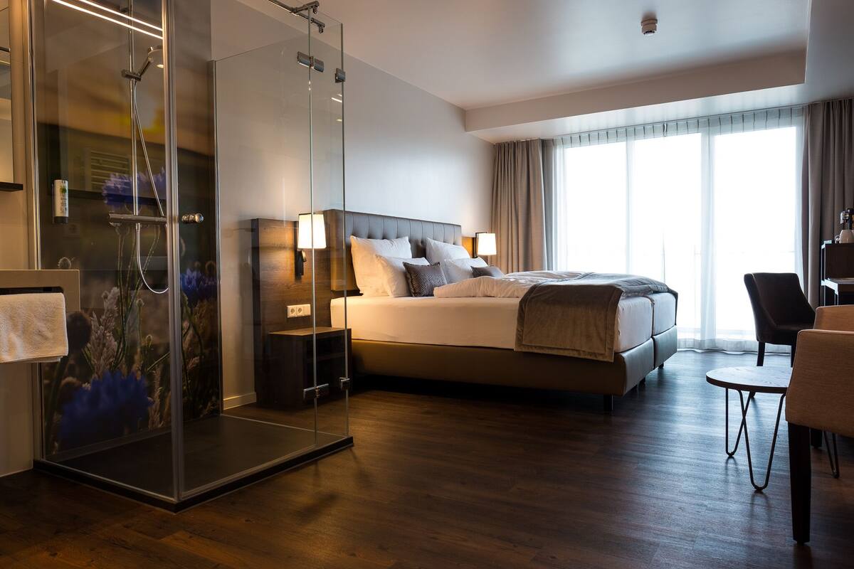 junior room (main building) | living area | 49-inch flat-screen tv with satellite channels, tv, heated floors