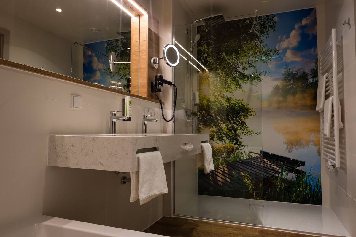 comfort double room (main building) | bathroom | hair dryer, heated floors, towels, soap