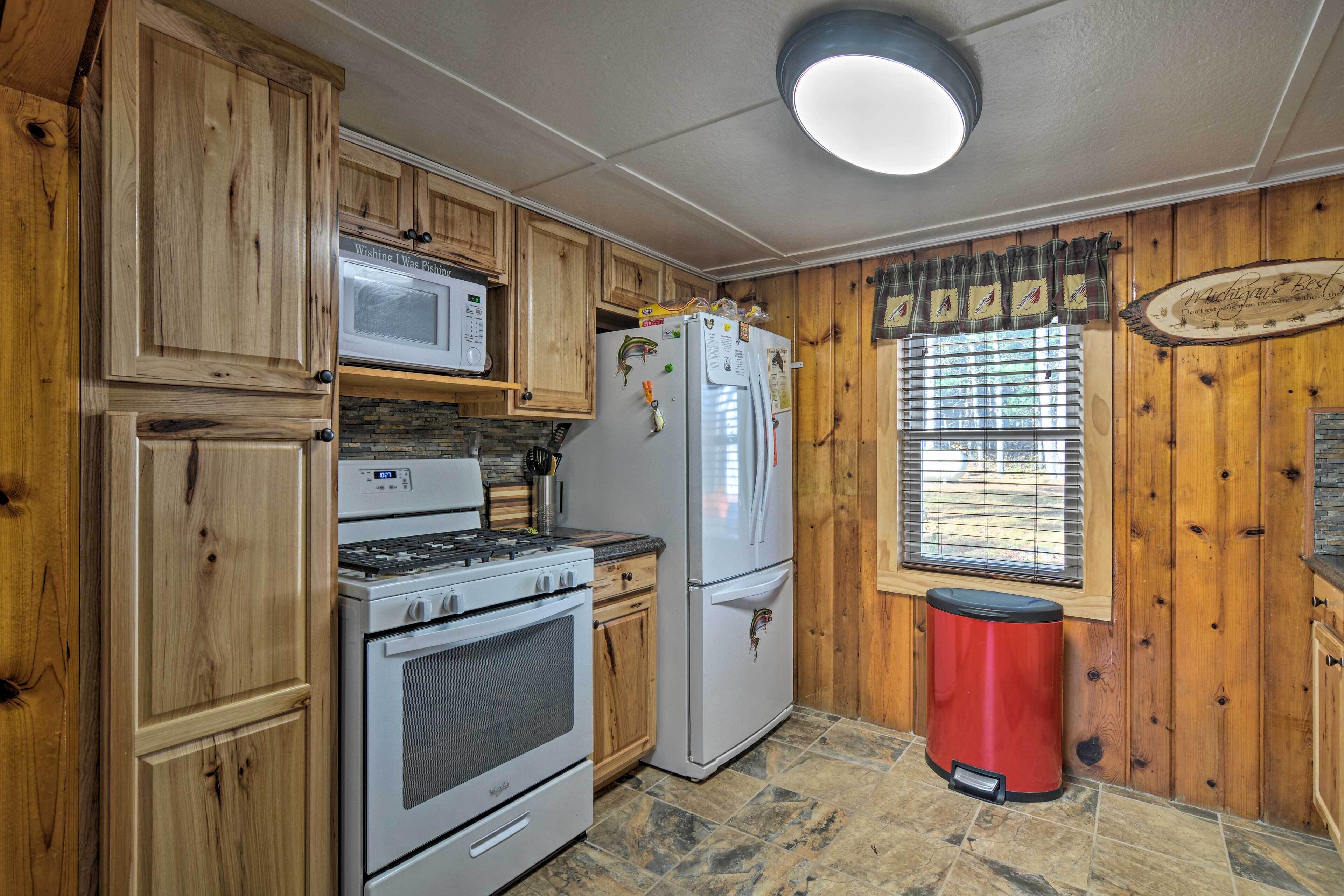 Riverfront Grayling Retreat w/ Fire Pit & Dock!