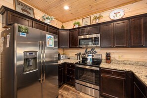 Fridge, microwave, oven, stovetop - Stunning retreat: resort pool, theater, games, and mountain views for groups (Pigeon Forge)