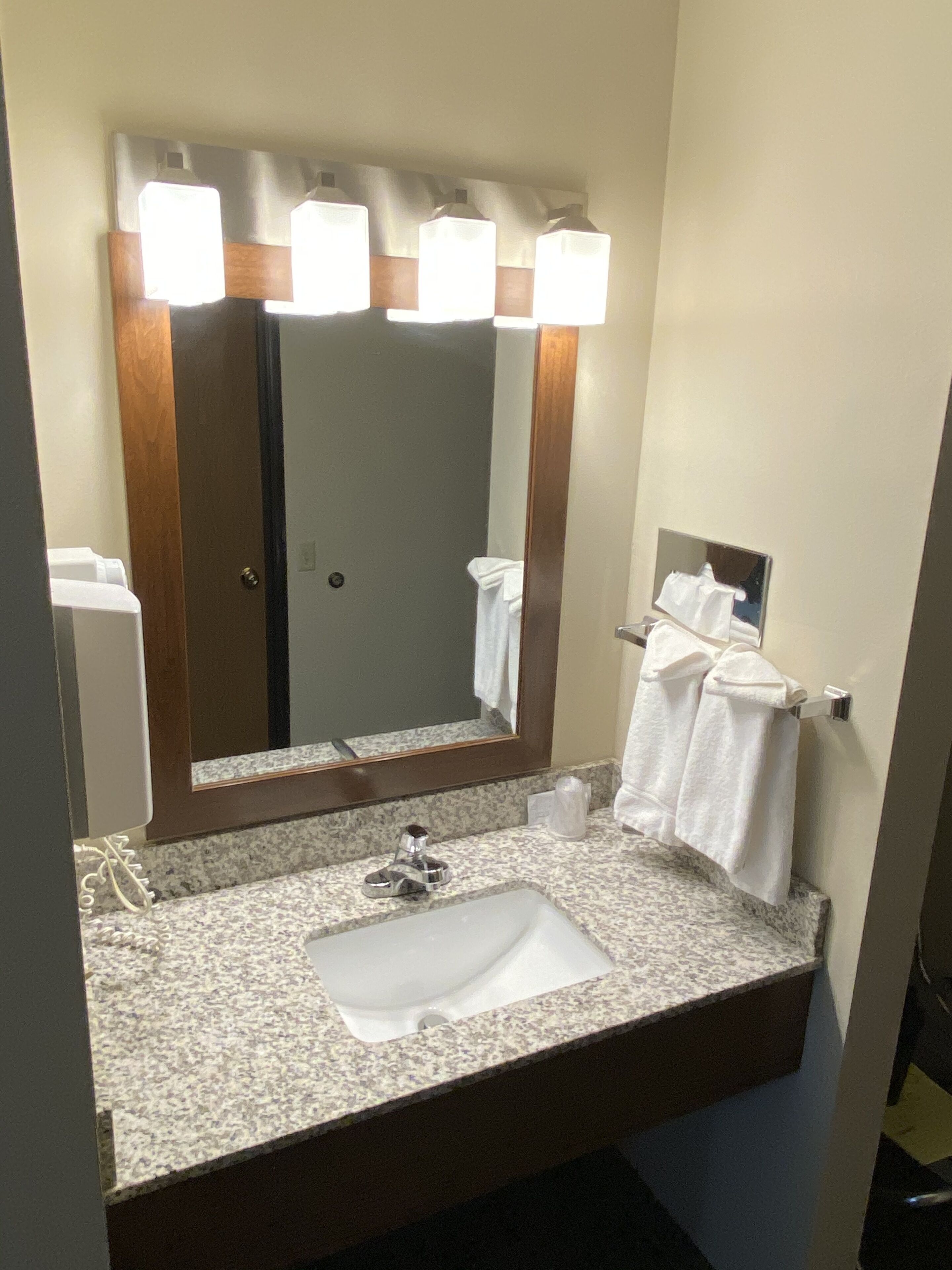 combined shower/bathtub, hair dryer, towels, soap