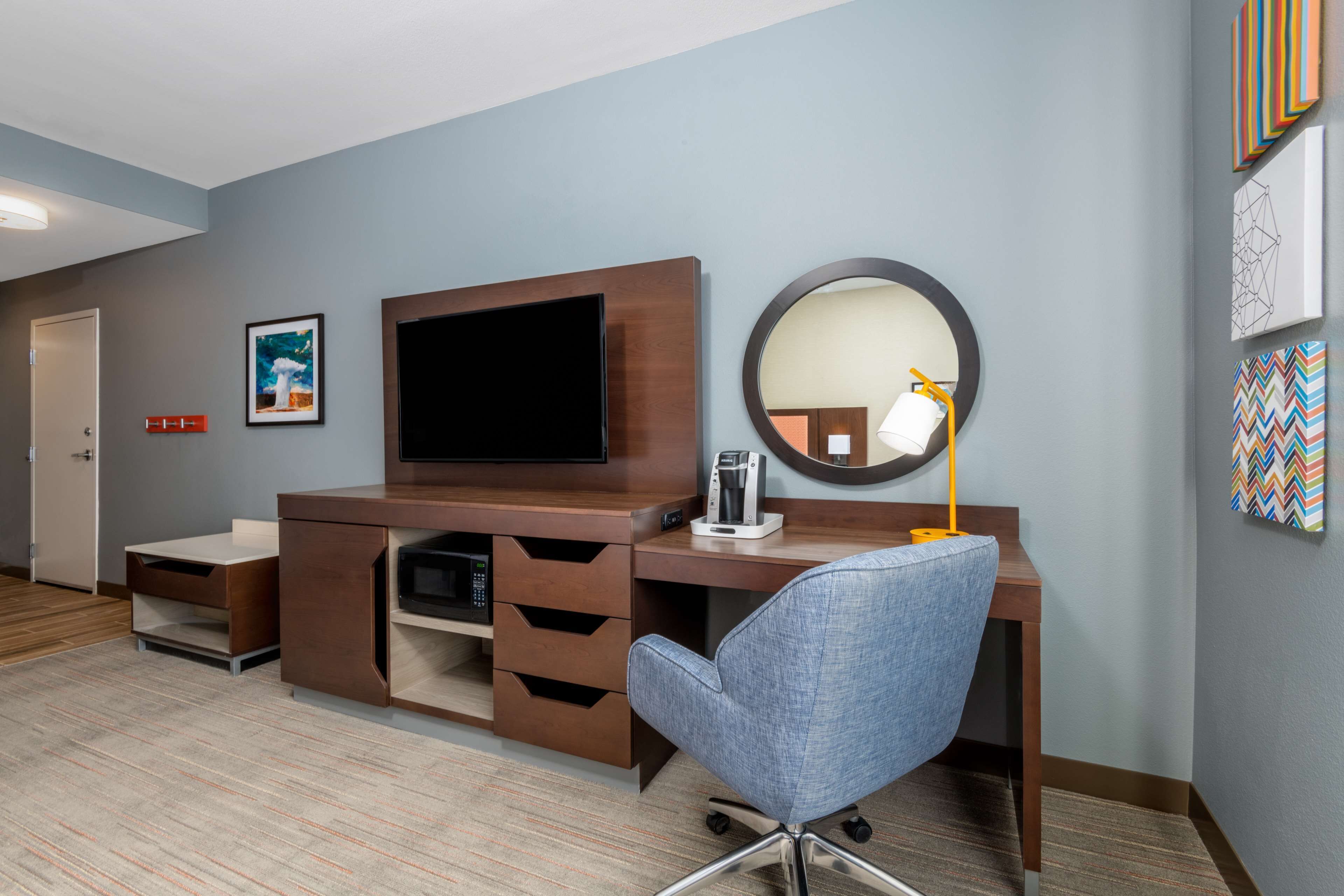 desk, laptop workspace, blackout curtains, iron/ironing board