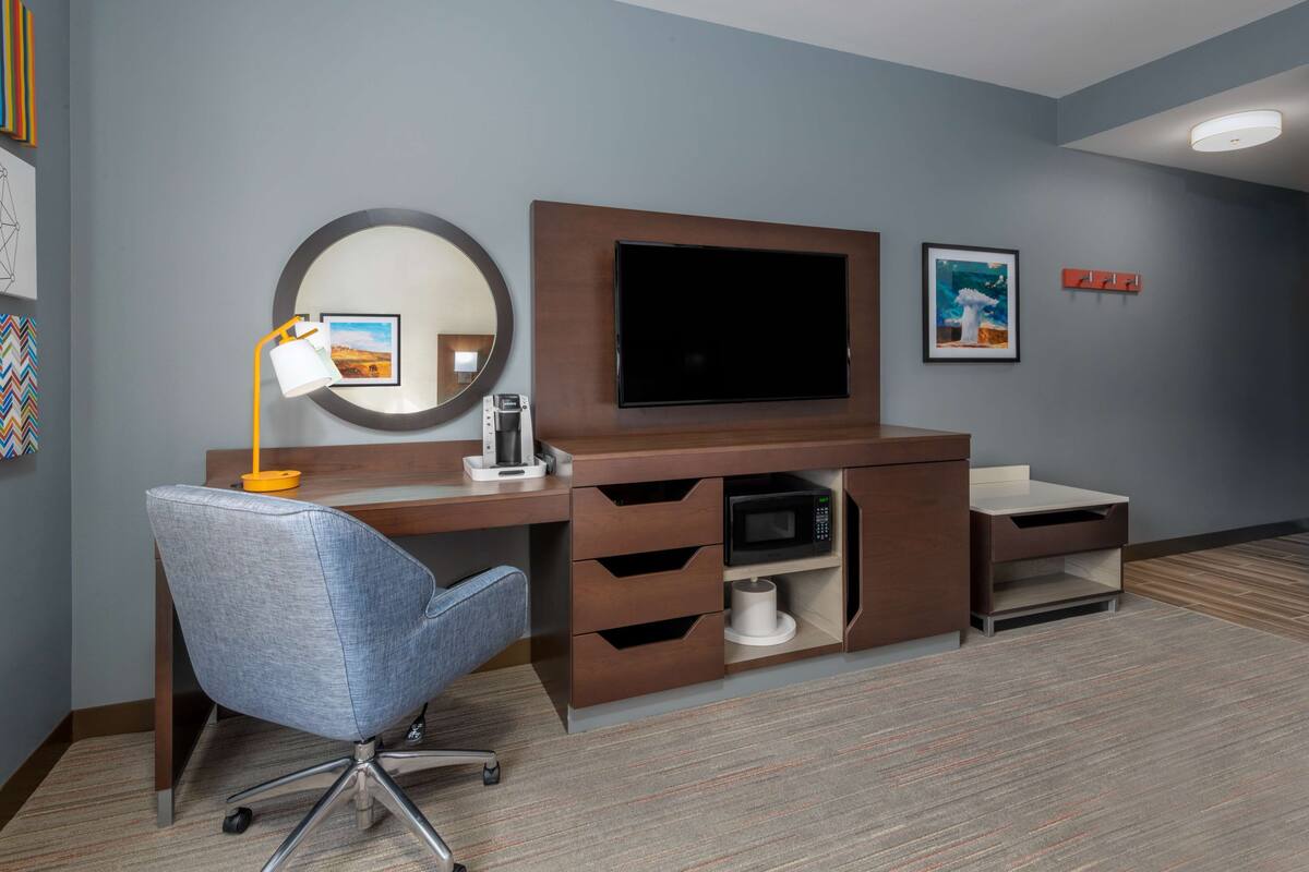 room, 1 king bed, refrigerator & microwave | desk, laptop workspace, blackout curtains, iron/ironing board