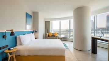 Deluxe Suite, 1 King Bed | In-room safe, desk, laptop workspace, soundproofing