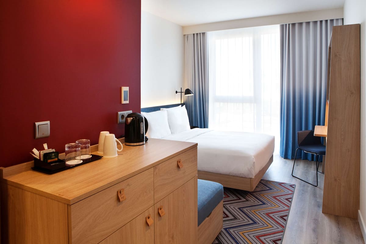 Roupas de cama premium, cofres nos quartos, individualmente decorados