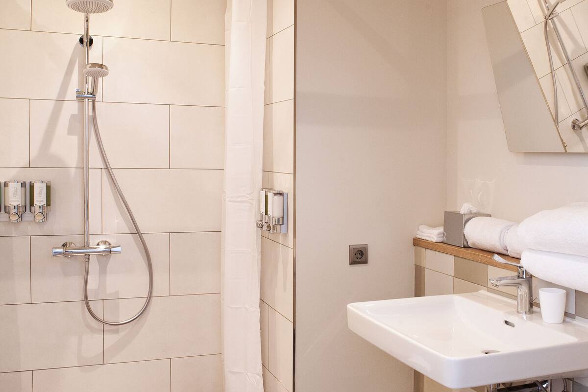 room, 1 queen bed, accessible | bathroom | shower, rainfall showerhead, free toiletries, hair dryer