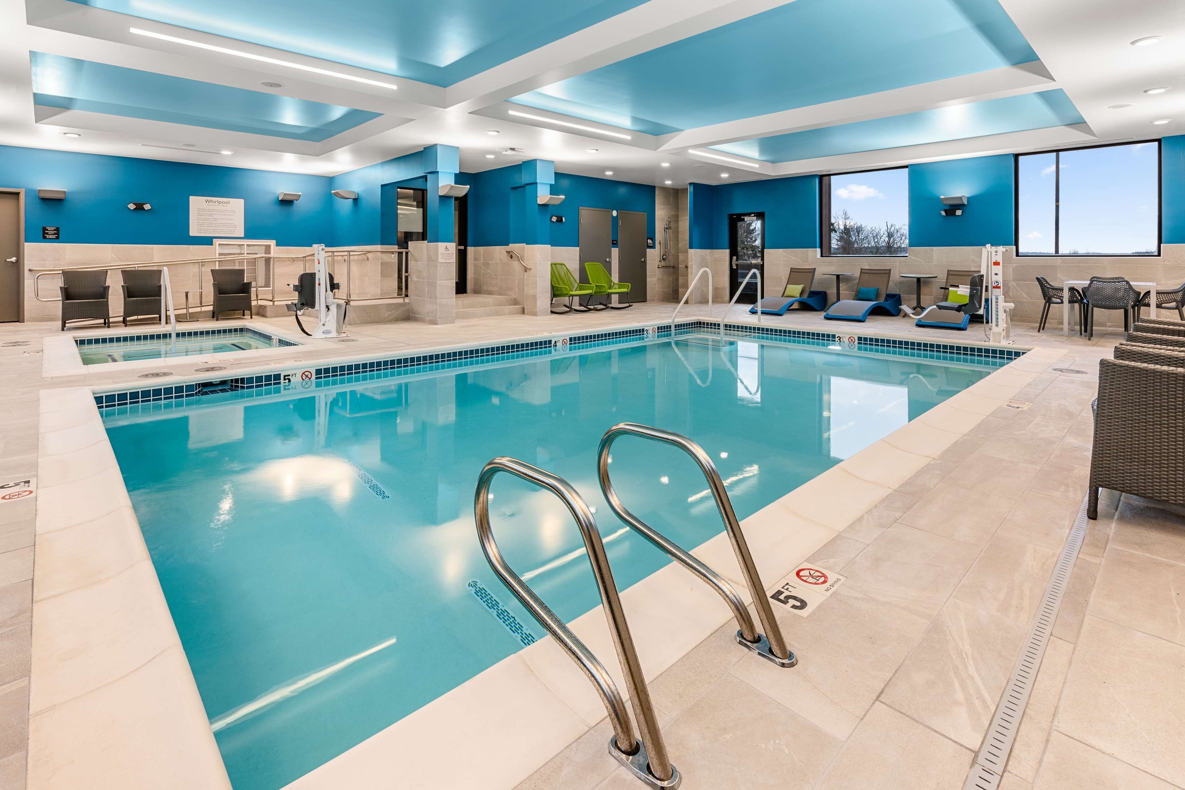 indoor pool, open 7:00 am to 10:00 pm, pool loungers
