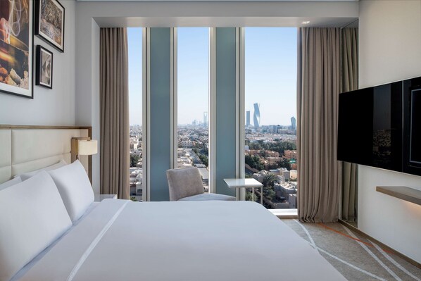 Premium bedding, memory-foam beds, minibar, in-room safe