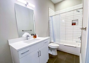 Shower, eco-friendly toiletries, hair dryer, towels