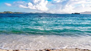 On the beach, sun loungers, beach towels