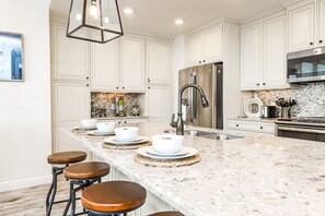 Condo, 3 Bedrooms | Private kitchen | Fridge, microwave, stovetop, cookware/dishes/utensils - One Particular Harbour by AMI Locals (Bradenton)