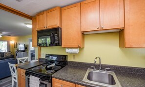 Condo, 2 Bedrooms | Private kitchen | Fridge, microwave, stovetop, dishwasher - Lazy Livin by AMI Locals (Bradenton Beach)