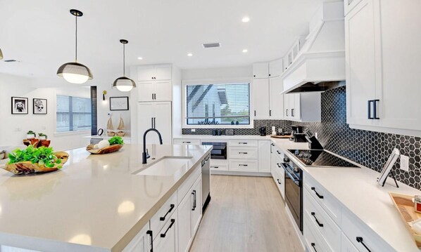 House, 4 Bedrooms | Private kitchen | Fridge, microwave, stovetop, dishwasher - Seashore Haven by AMI Locals (Holmes Beach)