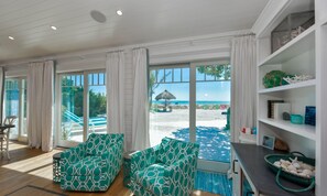 House, Multiple Beds | Living room - The Tiki by AMI Locals (Holmes Beach)