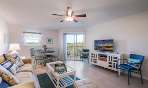 Condo, 2 Bedrooms | Living room | 36-inch TV with cable channels - Sandy Pointe by AMI Locals (Holmes Beach)