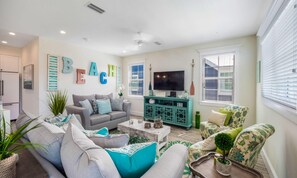 House, 5 Bedrooms | Living room | 42-inch TV with cable channels - Under the Sea by AMI Locals (Anna Maria)