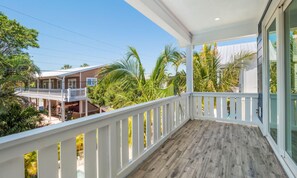 House, 5 Bedrooms | Balcony - Sign of the Mermaid by AMI Locals (Anna Maria)