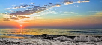 New 5 bedroom & 6 bathroom waterfront home on canal with pool close to beach!