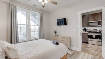 1 bedroom, desk, iron/ironing board, travel crib