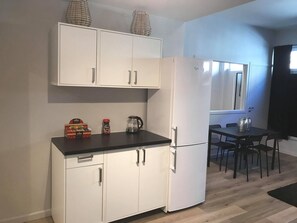 Apartamento | Cocina privada | Hervidor eléctrico y utensilios de cocina