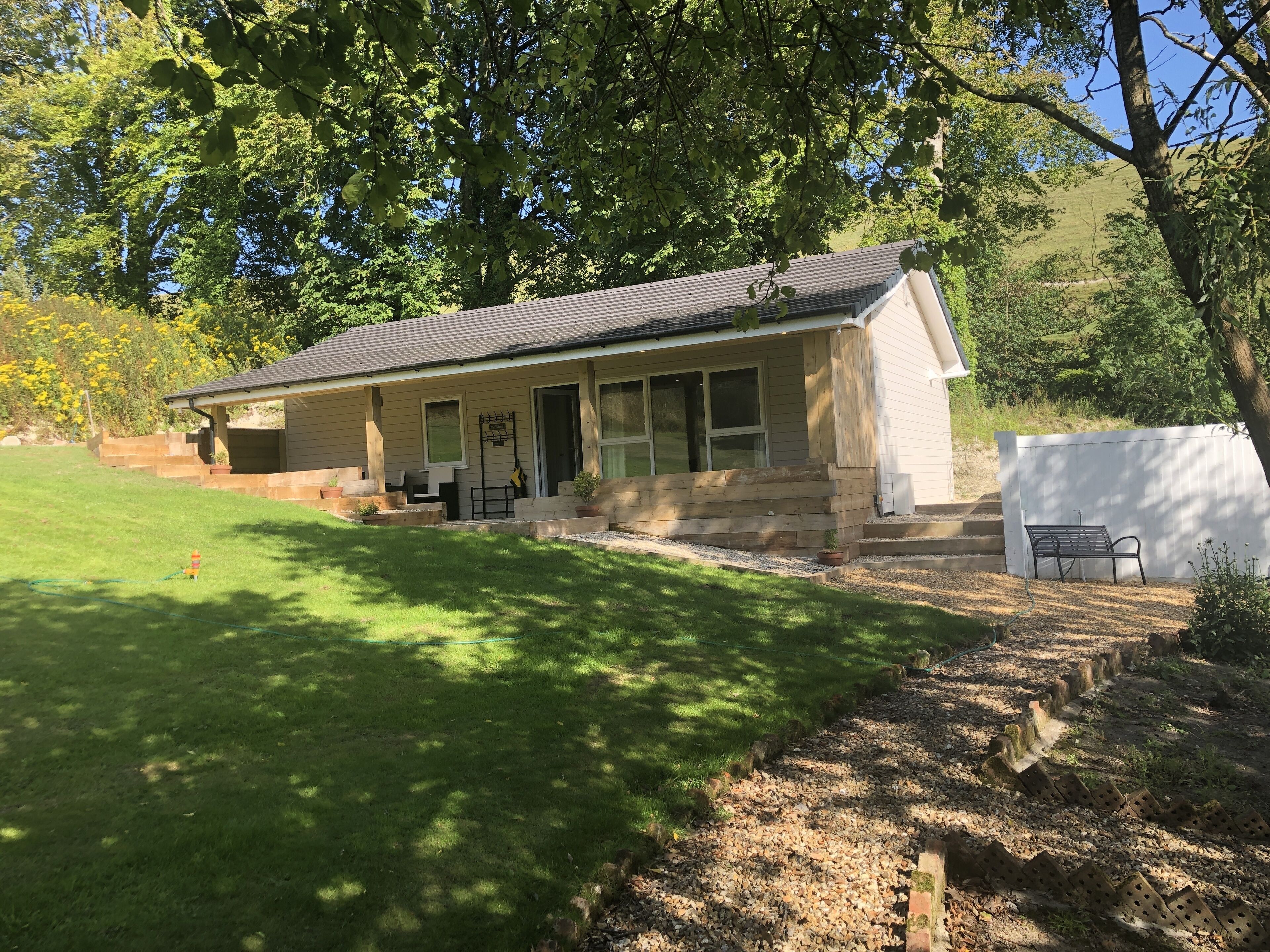 A luxury garden lodge with HOT-TUB, sun terrace - sleeps up to 7 guests