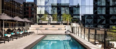 Outdoor pool, open 10:00 AM to 9:00 PM, sun loungers
