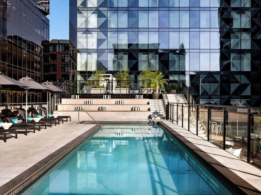 Outdoor pool, open 10:00 AM to 9:00 PM, pool loungers