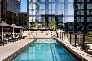 Outdoor pool, open 10:00 AM to 9:00 PM, pool loungers - Humaniti Hotel Montreal, Autograph Collection (Montreal)
