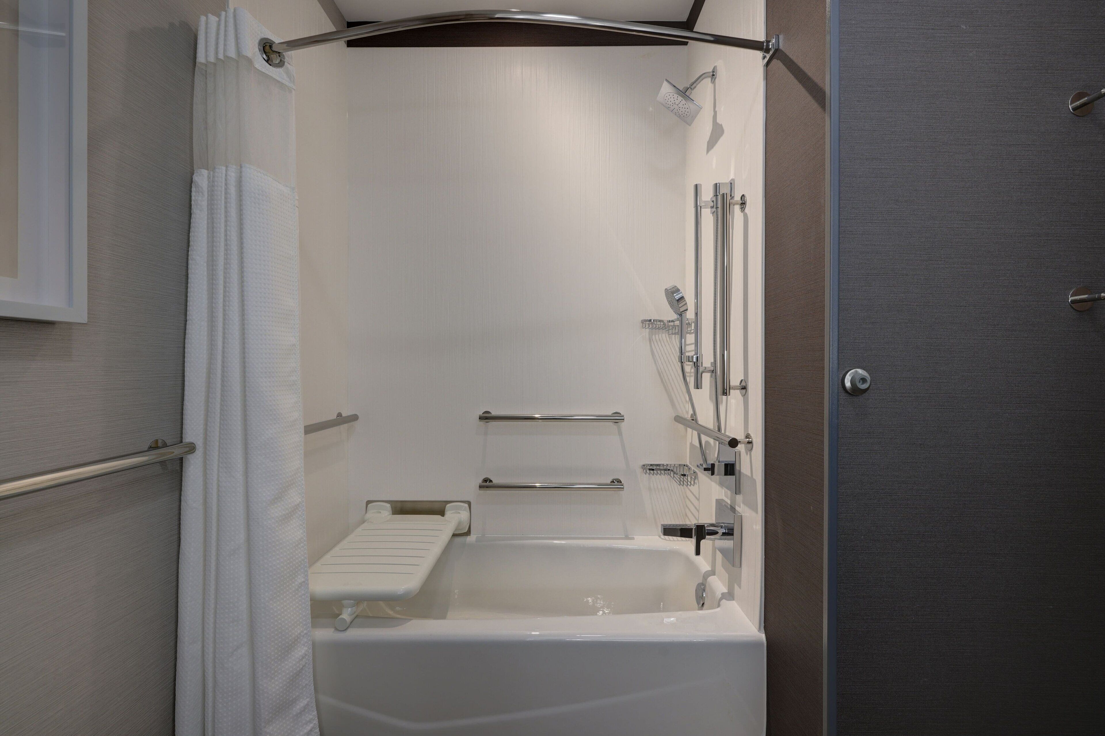 room, 2 queen beds | bathroom | hydromassage showerhead, designer toiletries, hair dryer, towels