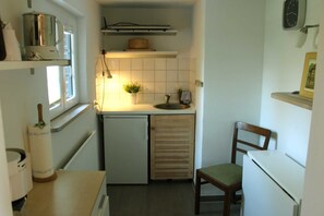 Fridge, microwave, coffee/tea maker, electric kettle