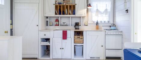 Microwave, stovetop, coffee/tea maker, toaster