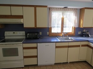 Microwave, stovetop, dishwasher, coffee/tea maker