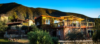 3 comfortable individuals cabins in a property with stunning views of the valley