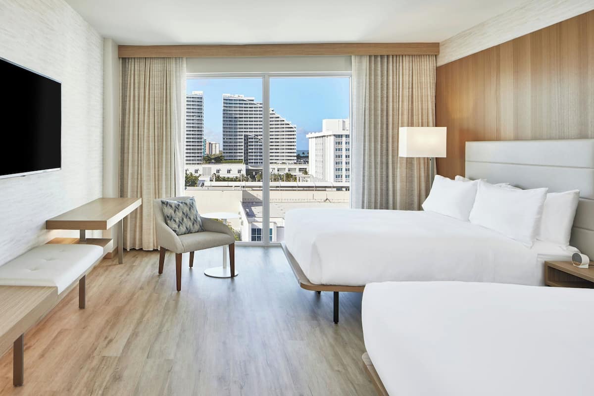 Premium bedding, pillowtop beds, in-room safe, blackout drapes