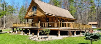 secluded log home, minutes from all star village in Oneonta