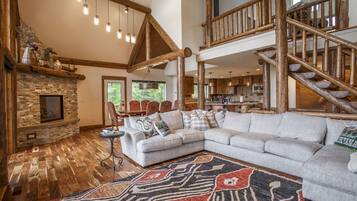 Smart TV, fireplace, books, stereo