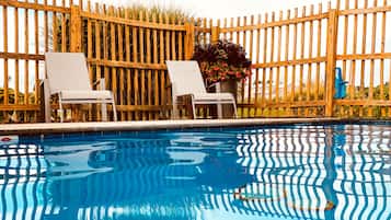 Seasonal outdoor pool, pool umbrellas