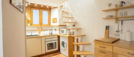 Microondas, horno, parrilla de estufa y tostadora