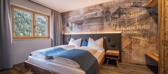 Appartamento "Seebrunn - Schusterhüttl Alm" con vista sulle montagne e sul lago, terrazza e giardino