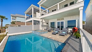 A modern two-story house with a pool, outdoor seating, and a sign reading "Tide Life". - "Tide Life" - Perfect Sized Family Beach House (Panama City Beach)