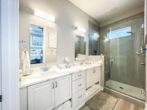 Combined shower/tub, towels, soap, toilet paper