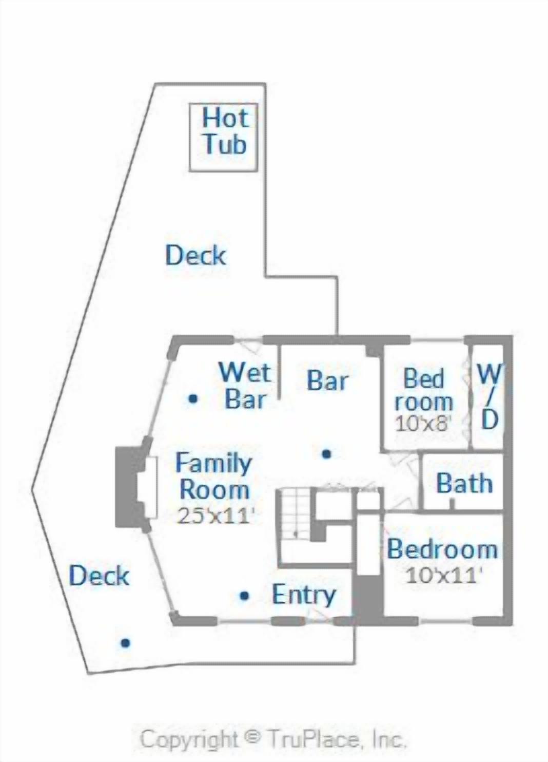 A floor plan with a wet bar, family room, entry, bedroom, and bathroom.